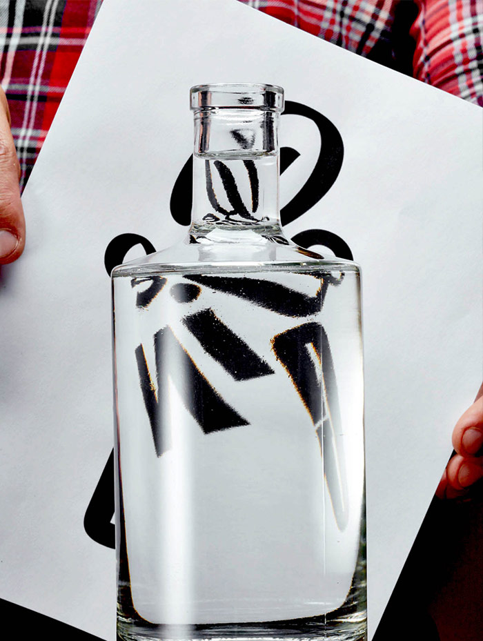 image of liquor bottle and typography